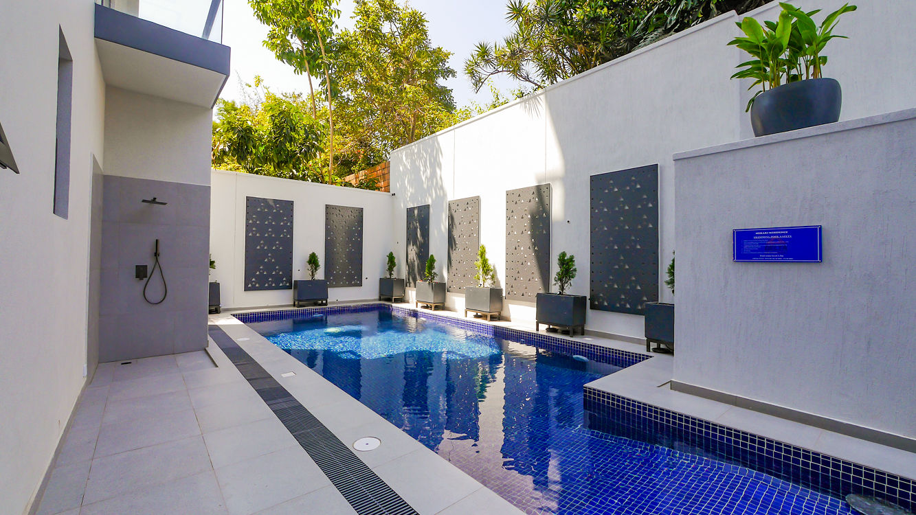 Meraki Residence — swimming pool and shower area