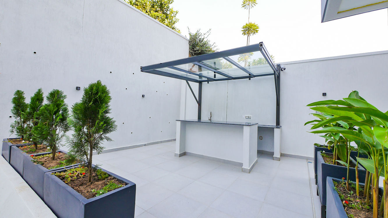 Meraki Residence — outdoor kitchen and bar area