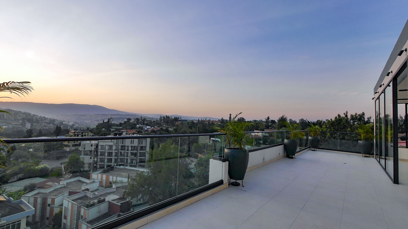 Meraki Residence — rooftop terrace at sunset